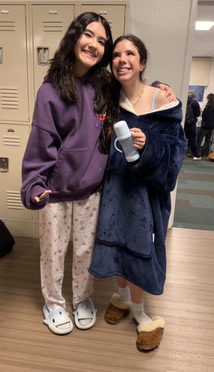 Thursday was age day! Freshman were babies, sophomores were teens, juniors were parents, and seniors were senior citizens. Two of our freshmen, Amy and Mazalit, were looking cute and comfy in their toddler outfits. 

