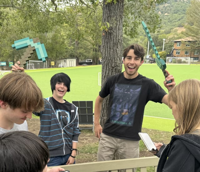 12th graders Alden Brown-Lewin and Noah-Brown Lewin at the SD Club Fair