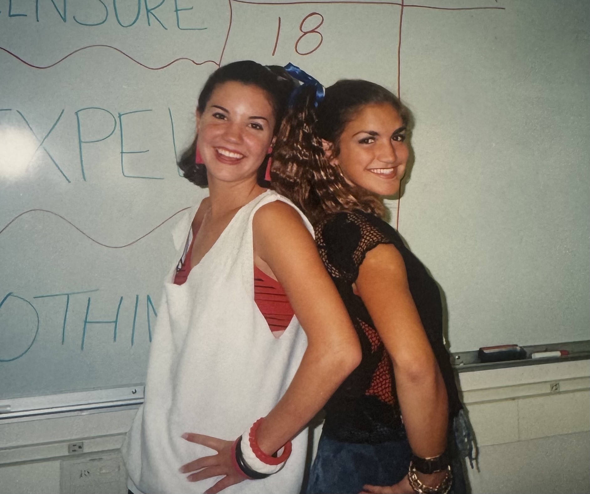 (Upper school English teacher)Gina Jaeger and a friend enjoying a spirit day in high school 